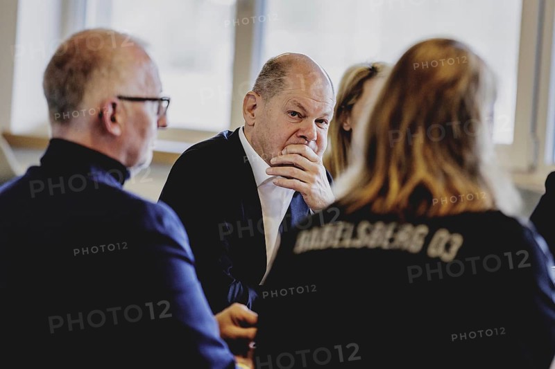 Olaf Scholz (SPD), Federal Chancellor, at a meeting with migrants and people involved in the field at SV Babelsberg in Potsdam, 26 February 2024