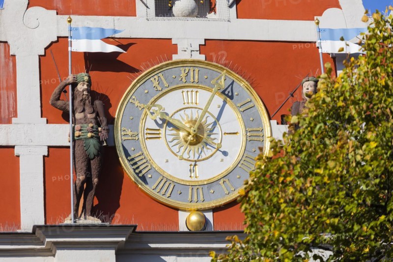 Built in the Renaissance style (1582, 1586), the town hall's main façade is enlivened by two decorative gables. The east gable is adorned with an ornate clock with the historic clock face from 1585 framed by a wild man and a wild woman, Arnstadt, Thuringia, Germany, Europe