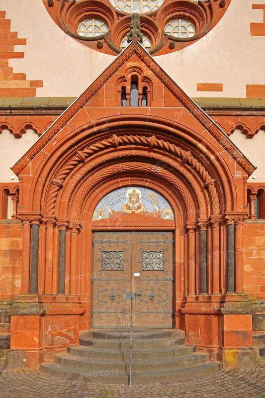 Portal with fittings of the neo-Romanesque St. Lutwinus Church, tympanum, decoration, church door, open staircase, Mettlach, Saarland, Germany, Europe
