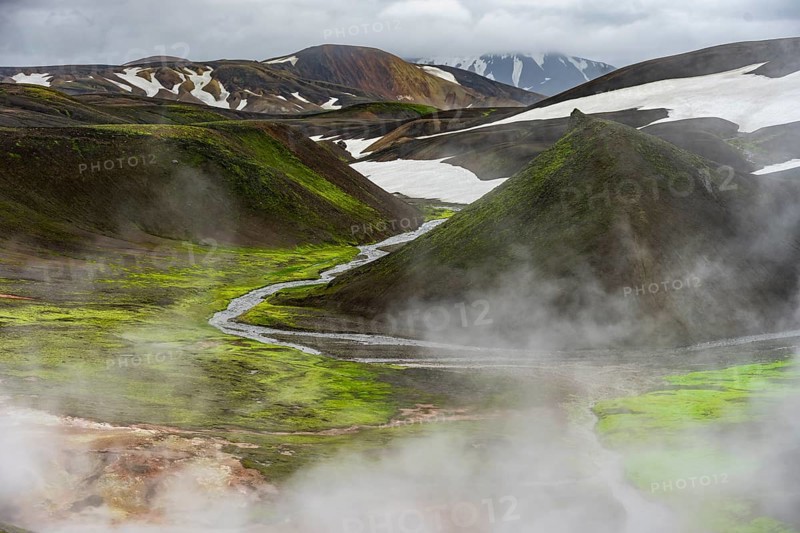 Colourful volcanic landscape with hills and snow, volcanic steaming hot springs, Laugavegur trekking trail, Landmannalaugar, Fjallabak Nature Reserve, Icelandic Highlands, Suðurland, Iceland, Europe