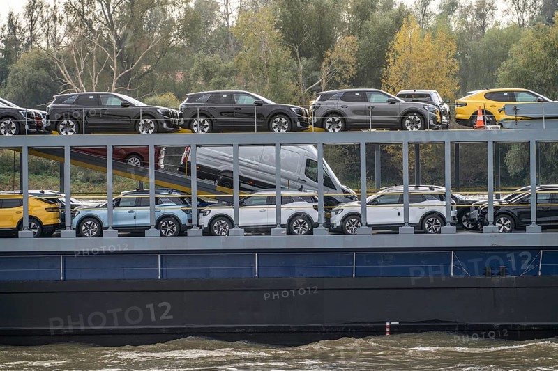Car transporter Freighter Forenso, on the Rhine near Rees, brings Ford Explorer e-cars from the Ford plant in Cologne to the seaports of the Netherlands for onward transport overseas, North Rhine-Westphalia, Germany, Europe