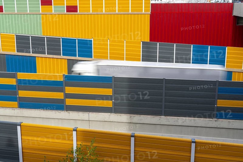 Colourful noise barriers on the A52 motorway, at the Essen-Rüttenscheid junction, the noise barriers were rebuilt in a colourful design as part of the motorway renovation, North Rhine-Westphalia, Germany, Europe