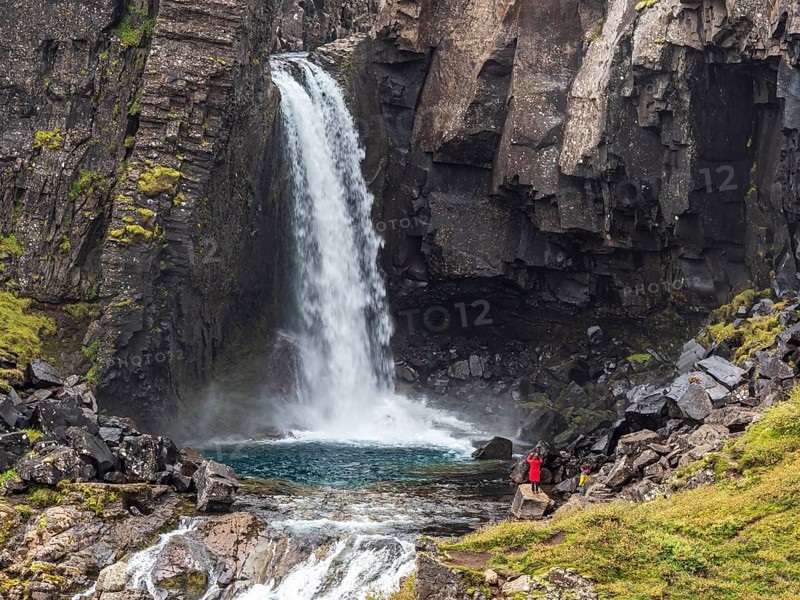 Waterfall Folaldafoss, at Öxi Mountain Road 939, tourists, East Fjords, Iceland, Europe