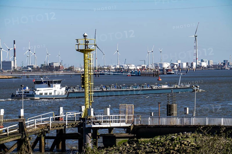 The port of Antwerp, on the Scheldt, is the second largest seaport in Europe, barges on the Scheldt, tank storage, chemical plants, Flanders, Belgium, Europe