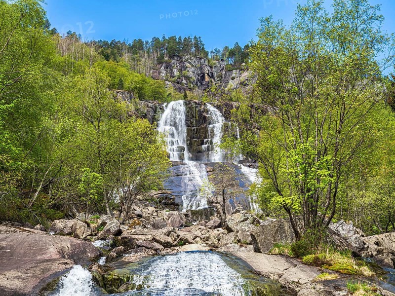 Waterfall Strandsfossen south of town Odda at fjord Sørfjord, branch of Hardangerfjord, Hordaland, Norway, Europe
