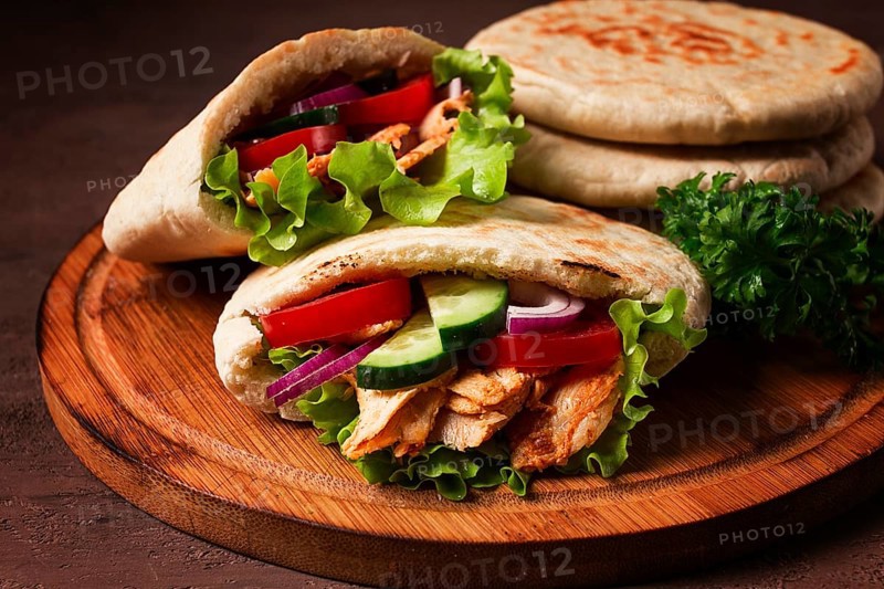 Shawarma in pita bread, chicken, with vegetables, homemade, no people
