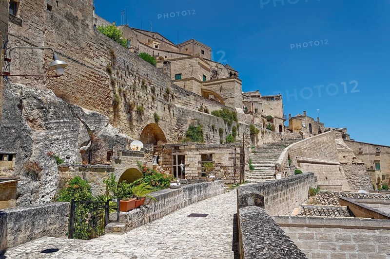 Paths and corridors in the tuff of the Sassi Barisano in the cave town of Matera. The cave settlements, Sassi, are a UNESCO World Heritage Site. Matera, Basilicata, Southern Italy, Southern Europe