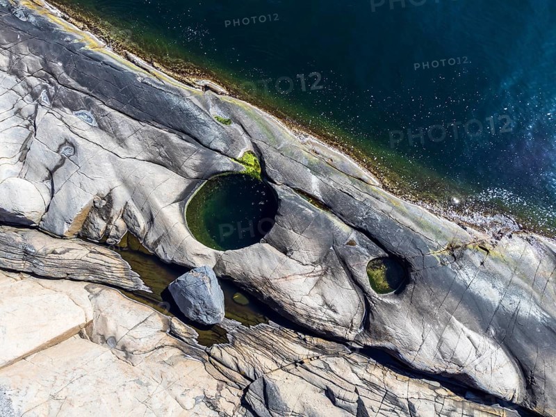 Glacial holes at the coast, near Sild, norwegian south coast, Norway, Europe