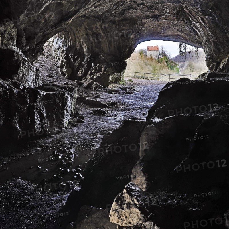 View from the Feldhof Cave in the Hönne Valley in Balve to Klusenstein Castle in Hemer, Märkisches Sauerland, North Rhine-Westphalia, Germany, Europe
