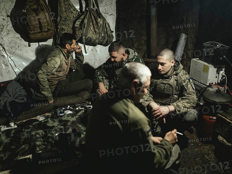Iura, Volodymyr, Daniel and Ruslan wait with a 122 mm artillery gun from Soviet stocks for the order to deploy. Normally they are in position for a month. This time, however, they have been waiting longer for relief, near Kupyansk, Ukraine, 2024, Europe