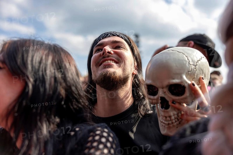 Adenau, Germany, 7 June 2024: Fan with skull at Rock am Ring. The festival takes place at the Nürburgring race track near the town of Adenau from 7 to 9 June 2024, Europe