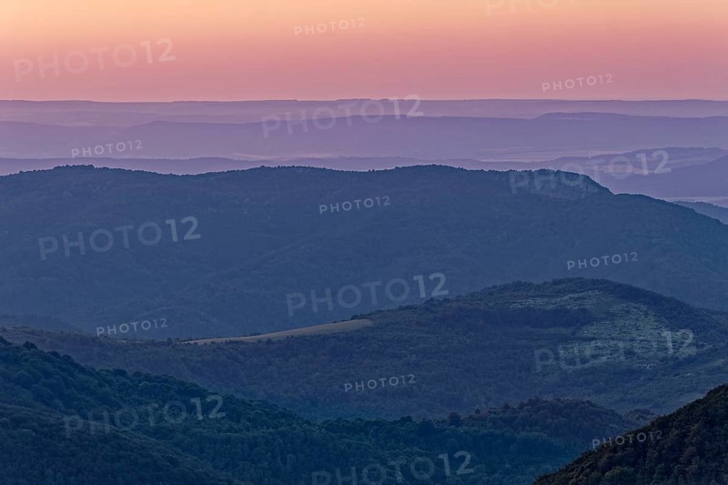 Dawn over the mountain landscape of the Balkan Mountains and the wooded slopes of the Balgarka nature park Park in Central Bulgaria. Shipka, Gabrovo, Bulgaria, South-East Europe, Europe