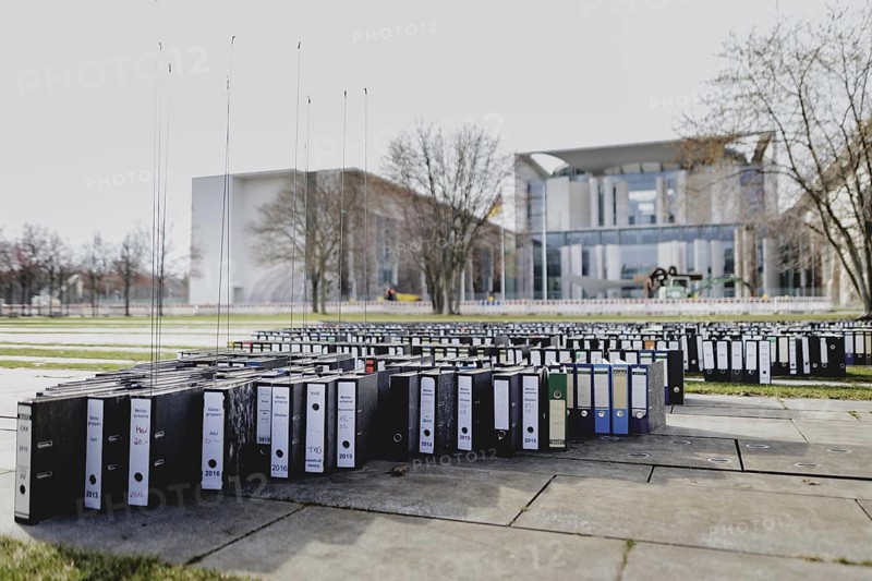 File folders stand in front of the Federal Chancellery as part of a protest action by the German Confederation of Skilled Crafts in Berlin, 26 February 2024. The German Confederation of Skilled Crafts demonstrates against the economic policy of the Federal Government as well as the high level of bureaucracy and the improvement of location conditions