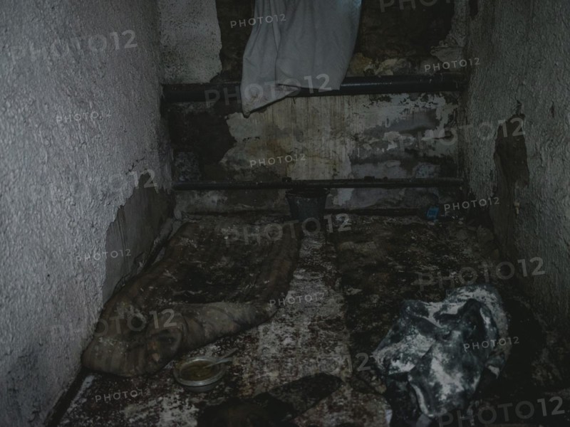 Cell in the basement of the police station. After the occupation of the city by the Russian army, over 200 people were imprisoned, interrogated and tortured here in freezing temperatures, Isjum, Kharkiv, Ukraine, Europe