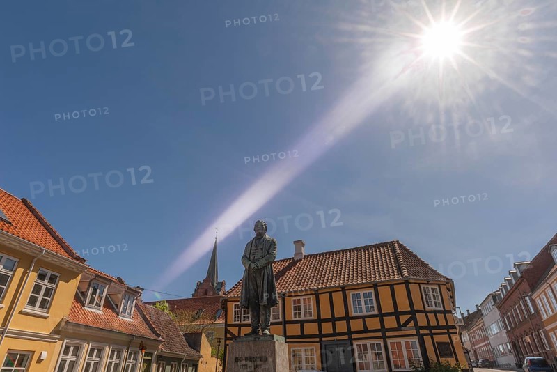 Old town of Rudkøbing, monument to Hans Christian Ørstedt (1777-1851), natural scientist, born in Rudkøbing, renovated houses, half-timbered house, Gaasetorvet square, backlight, Langeland island, Sydfyn, South Funen, Baltic Sea, Danish South Sea, Denmark, Europe