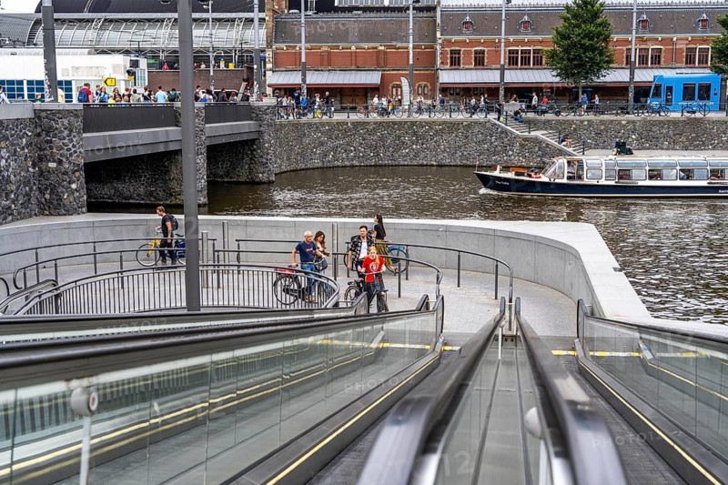 New bicycle car park at Amsterdam Central Station, Stationsplein, space for around 7000 bicycles, largest in Amsterdam, digitally monitored, underground, direct connection to the station and metro, Netherlands, escalators lead to the bicycle garage, Netherlands