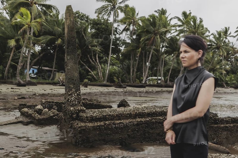 Annalena Bärbock (Bündnis 90/Die Grünen), Federal Foreign Minister, photographed during a briefing on coastal erosion at a cemetery near the settlement of Togoru, flooded by rising sea levels, 07.05.2024. Bärbock is travelling to Australia, New Zealand and Fiji for political talks / Photographed on behalf of the Federal Foreign Office