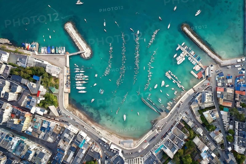 Aerial view of an idyllic harbor landscape with sailboats and yachts, AI generated