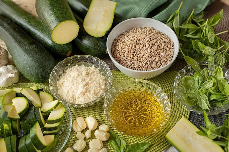 Pesto ingredients, courgette, sunflower seeds, cheese, olive oil, garlic and basil