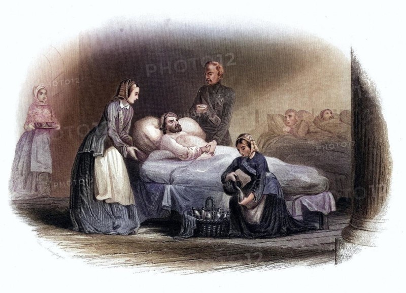 Florence Nightingale (12 May 1820 - 13 August 1910) was a British nurse, statistician, founder of modern western nursing, in the hospital at Scutari with the doctor who is taking the patient's pulse. Crimean War 1853-1856. engraving, Historic, digitally restored reproduction from a 19th century original, Record date not stated