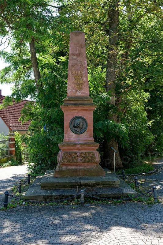 Bronze medallion of the philosopher Carl Christian Friedrich Krause by the sculptor Robert Henze, Krause monument, red sandstone obelisk, Eisenberg, Saale-Holzland district, Thuringia, Germany, Europe