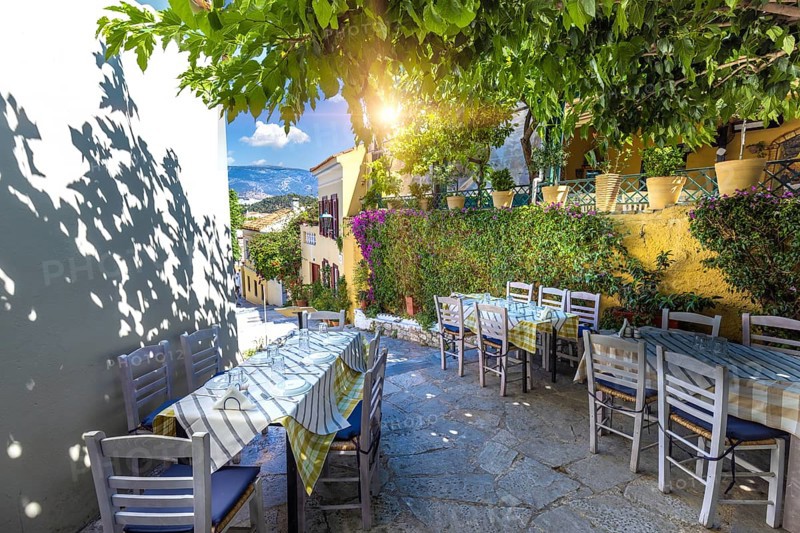 Greece, historic neighborhood of Plaka and Anafiotika in Athens with restaurants near Acropolis, Europe