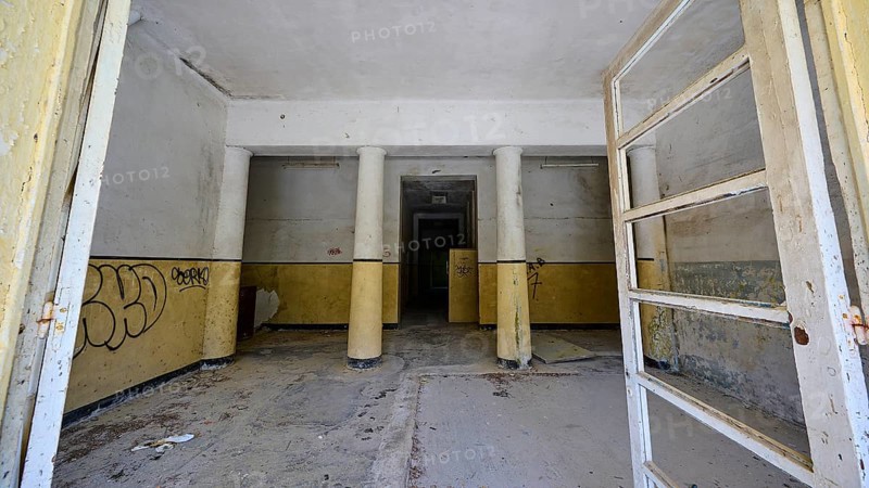 Abandoned interior with graffiti, pillars and bare walls in a desolate state, Lost Place, Former Santorium, Tuberculosis Centre 1947-1970, Former Italian Colonial Settlement, Eleousa, Campochiaro, Rhodes, Dodecanese, Greek Islands, Greece, Europe