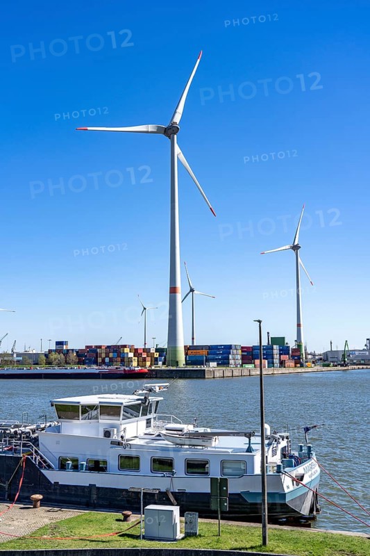The port of Antwerp, on the Scheldt, is the second largest seaport in Europe, Wind turbines in the harbour area, Flanders, Belgium, Europe