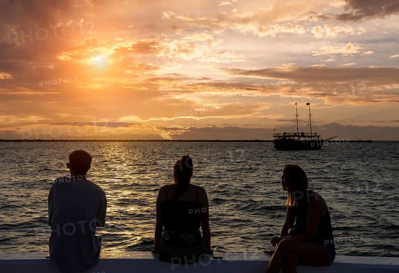 San Miguel de Cozumel, 10 October, 2021: Cozumel sea promenade and waterfront Malecon with statues, sculptures, cafes, restaurants and scenic ocean views of Cozumel ocean shore