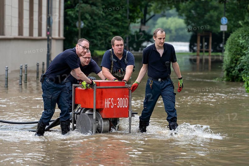 Flood on the Ruhr, after long heavy rainfall the river left its bed and flooded the countryside and villages, the highest water level ever recorded, the fire brigade pumps water out of the streets, Mülheim an der Ruhr, North Rhine-Westphalia, Germany, Europe
