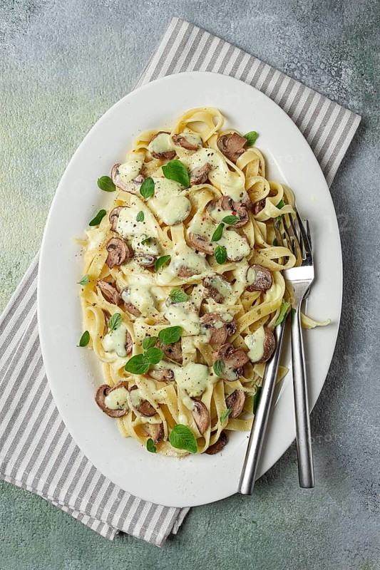 Fettuccine with champignons, basil, in cream sauce, homemade, no people