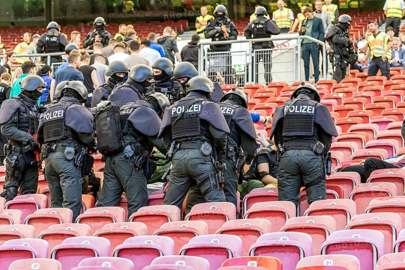 Baden-Württemberg police anti-terror exercise in the stadium. In the run-up to the European Football Championships, 1200 police officers rehearse for an emergency. Scenario: stabbing in the stands of the MHP Arena, VfB Stuttgart's stadium, which is also the venue for five European Championship matches. After initial treatment by the police, the handover of the injured to the emergency services and fire brigade was also rehearsed. Stuttgart, Baden-Württemberg, Germany, Europe