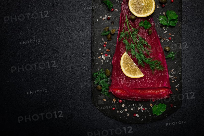 Salmon gravlax with beetroot, Scandinavian snack, beet gravlax, lightly salted fish, homemade, no people