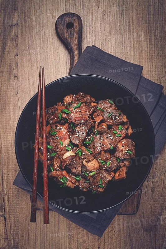 Bulgogi, with mushrooms, with sesame seeds and green onions, Korean cuisine, homemade, no people