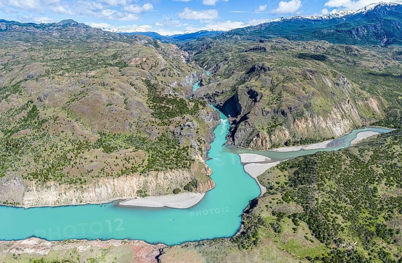 Confluence of river Rio Baker and Rio Chacabuco, aerial view, muddy water of Rio Chacabuco merges with glacial stream Rio Baker, Patagonia, Chile, South America