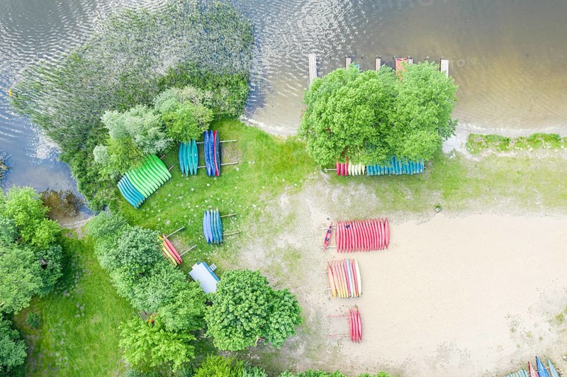 Canoes at a rental station, drone shot, village Granzow near Mirow, Mecklenburg lake district, Mecklenburg-Vorpommern, Germany, Europe