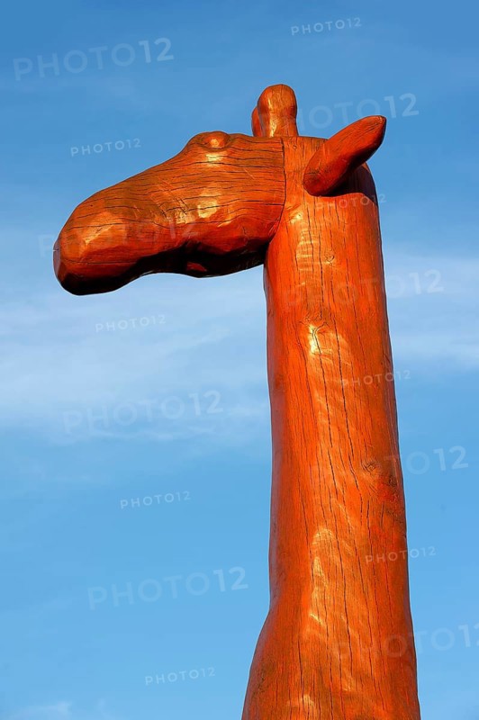 Head and neck of a giraffe made of red painted tree trunks, wooden sculpture by Günter Schumann, Museum der Phantasie by Lothar-Günther Buchheim, Bernried am Starnberger See, Upper Bavaria, Bavaria, Germany, Europe