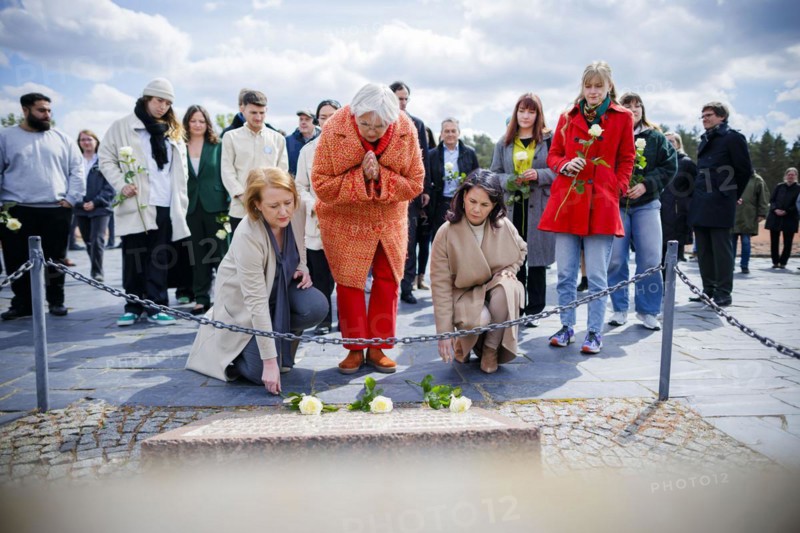 Visit to the Sachsenhausen Concentration Camp Memorial on the occasion of the programme 'Äô Youth Remembers 'Äô. (L-R) : Lisa Paus (Alliance 90/The Greens), Federal Minister for Family Affairs, Senior Citizens, Women and Youth, Claudia Roth (Alliance 90/The Greens), Minister of State for Culture and the Media, Annalena Bärbock (Alliance 90/The Greens), Federal Foreign Minister, lay flowers at a memorial stone. Oranienburg, 23.04.2024. Photographed on behalf of the Federal Foreign Office