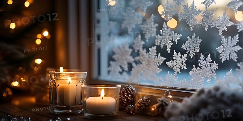 Snow-covered window with frost patterns, candlelight softly glowing through the glass, and warm, blurry Christmas lights in the background, AI generated