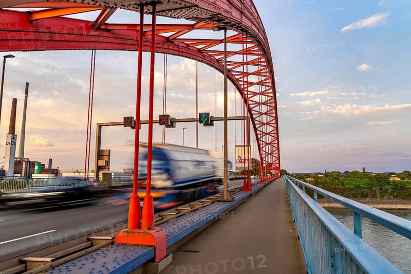 The Bridge of Solidarity, the longest tied-arch bridge in Germany, over the Rhine from Duisburg-Hochfeld to DU-Rheinhausen, the road bridge is dilapidated and has to be rebuilt, many thousands of lorries from the Logport port and cars use the bridge every day, new construction by 2040, Duisburg, North Rhine-Westphalia, Germany, Europe