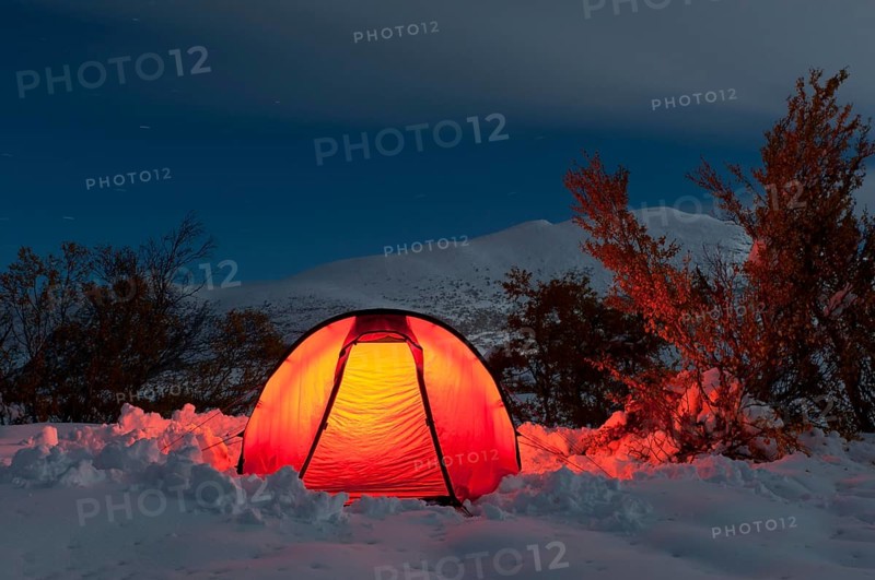 Illuminated tent on a bright moonlit night in the Doeralen valley, Rondane National Park, Oppland Fylke, Norway, Bivouac, Norway, Europe