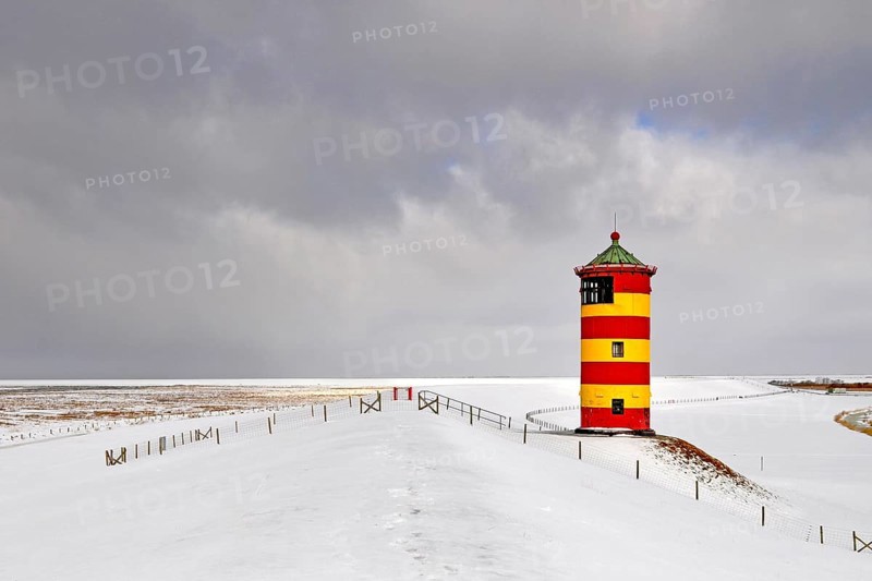 The lighthouse of Pilsum in winter, East Frisia, Lower Saxony, Federal Republic of Germany