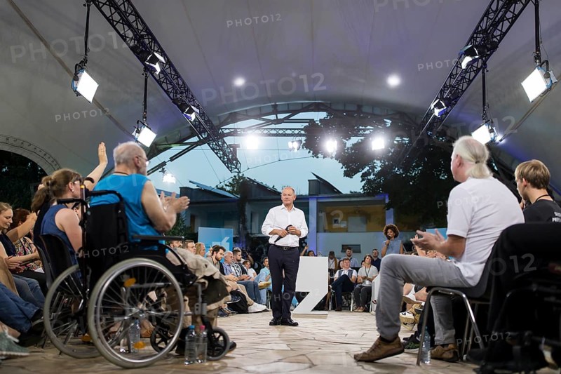 Olaf Scholz (Chancellor of the Federal Republic of Germany, SPD) surrounded by guests at the Chancellor's meeting at ufaFabrik in Berlin on 4 September 2024