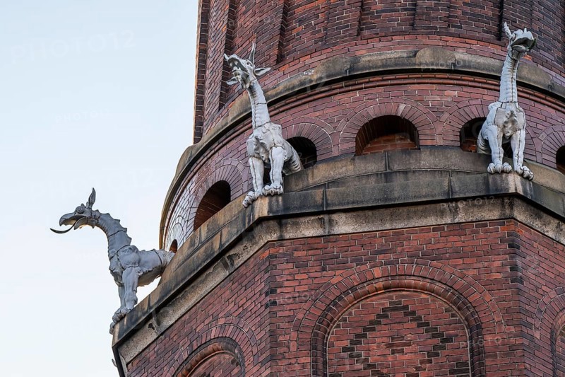 Detail of coiled industrial chimney by Carl Jacobsen, Vilhelm Dahlerup and PS Beckmann with replicas of the chimeras or gargoyle sculptures from Notre-Dame, Carlsberg district, Copenhagen, Denmark, Europe