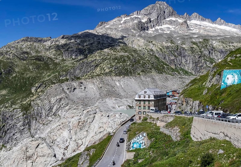 Hotel Belvédère on the Furka Pass, the most famous pass hotel in the world. The building is closed and falling into disrepair. A lost place. Drone photo. Obergoms, Canton Valais, Switzerland, Europe
