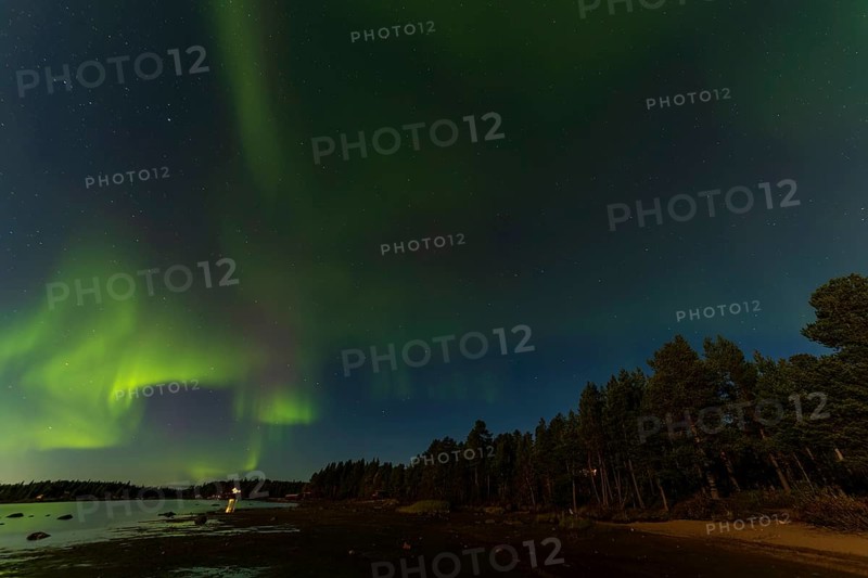 Northern lights, (Aurora borealis) at a lake near Kiruna, September 2024, Lapland, Sweden, Europe