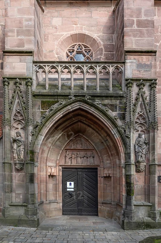 Main entrance portal of St Nicholas and St Ulrich Church, nave built around 1400, Kirchenberg 15, Nuremberg-Mögeldorf, Middle Franconia, Bavaria, Germany, Europe