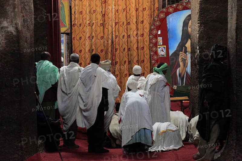 Rock churches of Lalibela, the World Heritage Church, Pray Medhane Alem, House of the World Heritage, Pilgrims praying in the church, Ethiopia, Africa