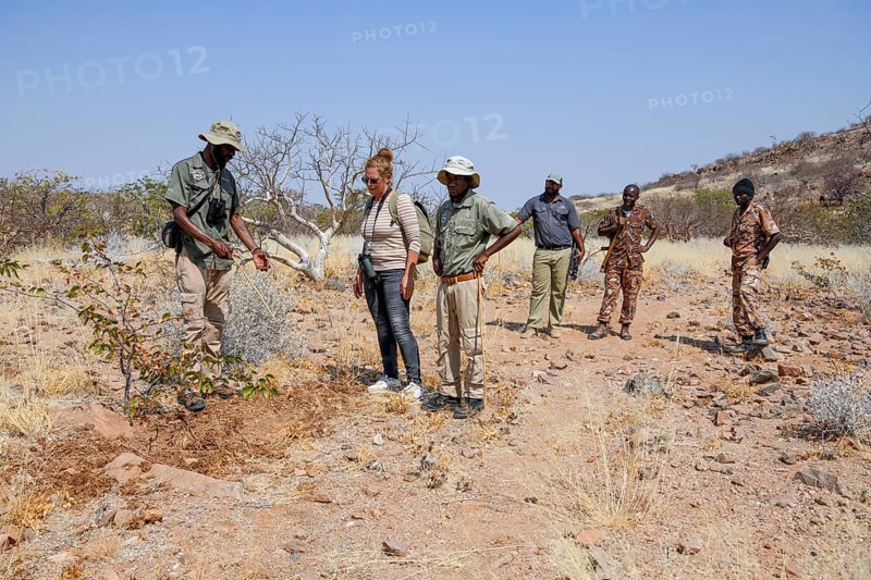 Tourist group on a rhino tracking trip, Huab Conservancy, near Khorixas, Kunene Region, Namibia, Africa