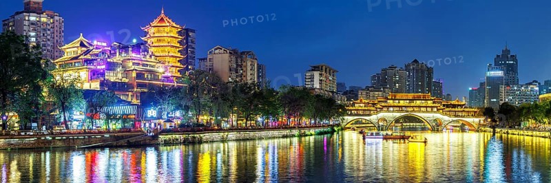 Chengdu Anshun Bridge over Jin River with pagoda panorama at night in Chengdu, China, Asia